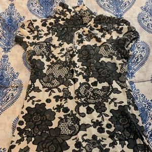 Black and white floral women’s Express turtleneck